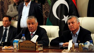 Libya's Prime Minister Ali Zeidan addresses a news conference after his release.