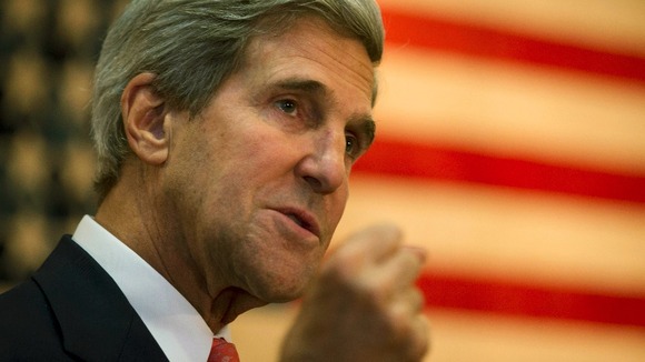 US Secretary of State John Kerry speaks during a break in a meeting with Afghan President Hamid Karzai.