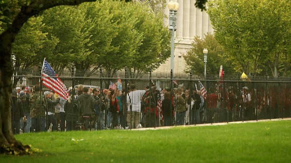 Protesters from the 'Million Vet March on the Memorials' demonstrate in front of the White House.