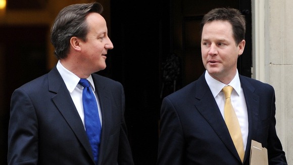 Prime Minister David Cameron and Deputy Prime Minister Nick Clegg, leave 10 Downing Street