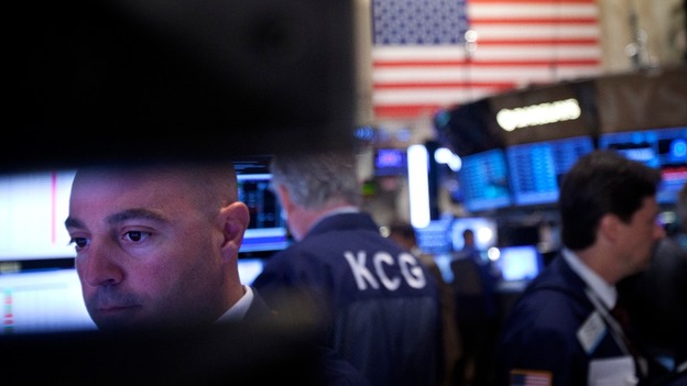 Traders work on the floor of the New York Stock Exchange