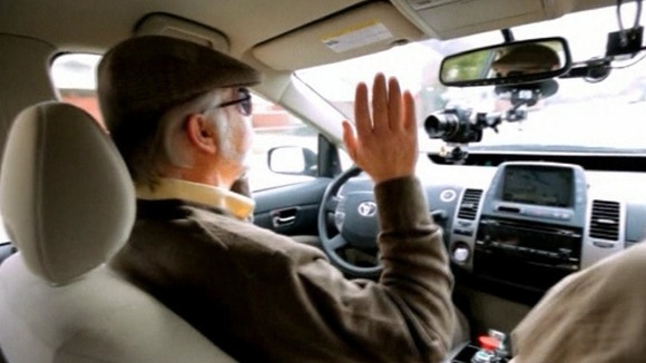 The test driver proves the car's autonomy with his hand off the wheel