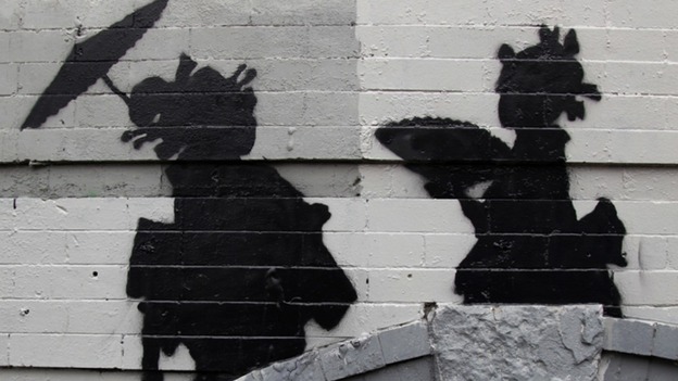Banksy's newest work in Williamsburg depicting two women in kimonos, before the work was defaced.