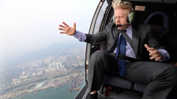 Johnson's iconic hairstyle was exposed to the elements during a helicopter ride.