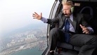 Johnson's iconic hairstyle was exposed to the elements during a helicopter ride.