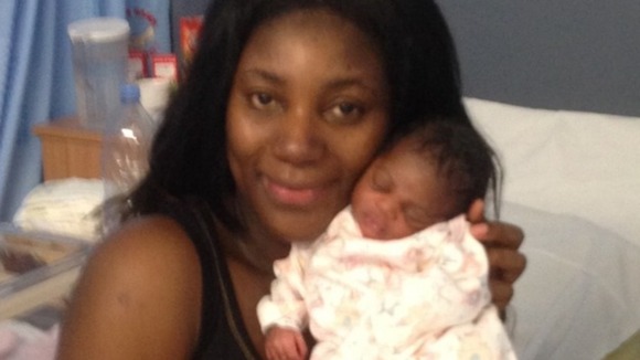 New mother Linda Frim-Pong and the yet-to-be-named baby girl delivered by PC Robert Morgan.