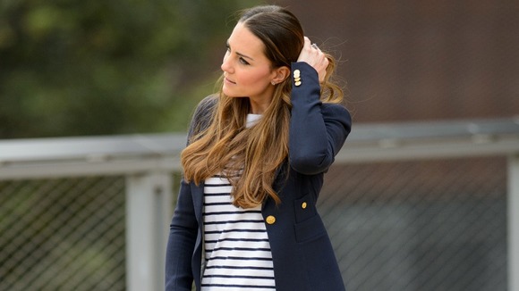 Kate takes a break during a visit to the SportsAid charity in east London
