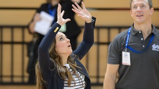 Kate playing volleyball while visiting the SportsAid charity in east London