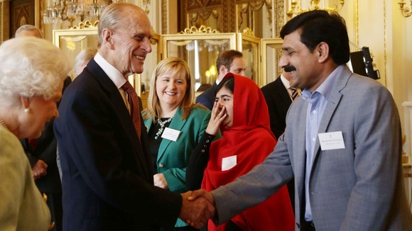 Malala went into a fit of giggles after a joke from Prince Philip
