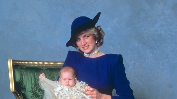Prince Harry, as a three month old baby, on his mother's knee on his Christening day, December 21, 1984.