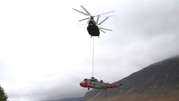 The Chinook transferred the Sea King to a waiting low loader.