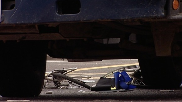 Cycle beneath the wheels of the HGV in Camden