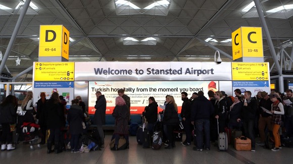 Passengers at Stansted Airport in Essex