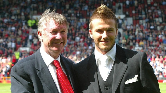 David Beckham with manger Sir Alex Ferguson in 2002