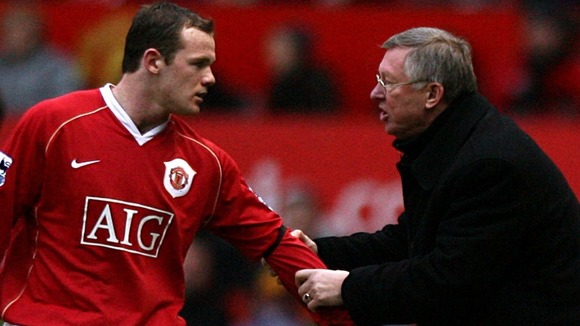 Sir Alex Ferguson gives instructions to Wayne Rooney