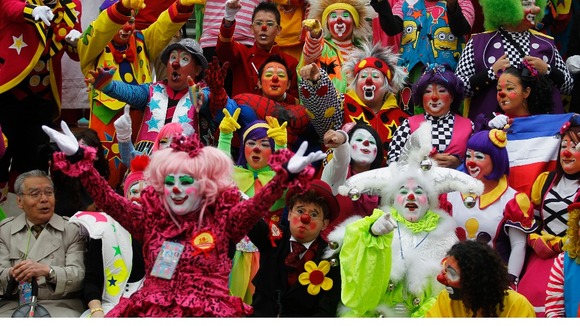 Clowns pose for a photo