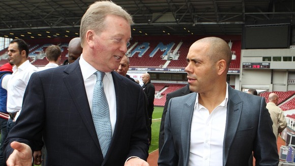 Frank Warren promoter of Dereck Chisora talks with Adam Booth, trainer and Manager of David Haye
