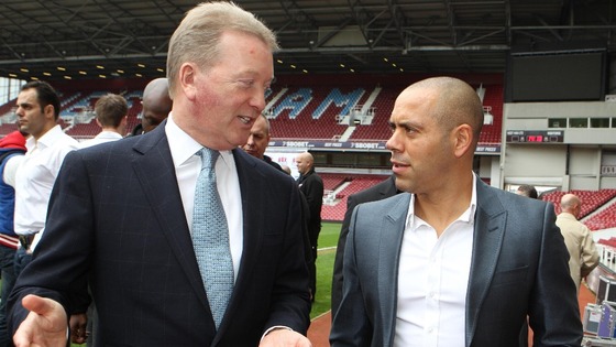 Frank Warren promoter of Dereck Chisora talks with Adam Booth, trainer and Manager of David Haye 