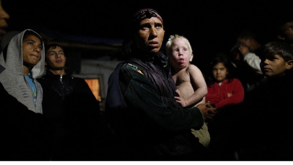 Ms Ruseva was pictured with her blonde-haired son Atanas, 2.