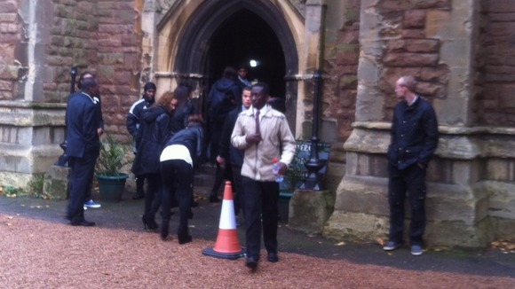 Family and friends say farewell to football coach Antoin Akpom