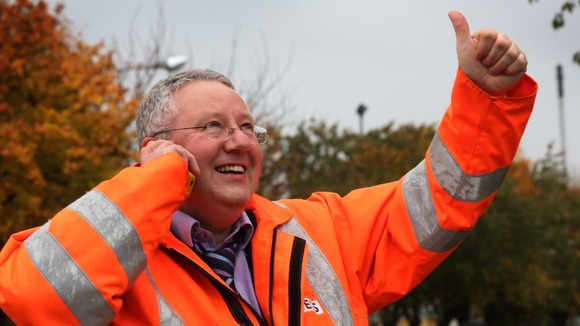 Worker Eddie Heaney celebrates after an announcement by owners Ineos to keep the Grangemouth petrochemical site open