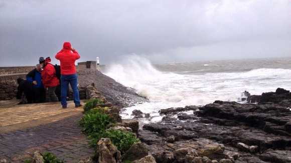 Spectators watch the waves at Porthcawl
