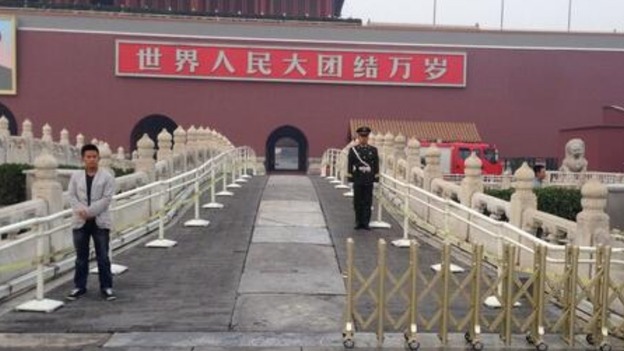 A fire engine in was the only evidence left of the crash today in Tiananmen Square.