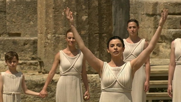 Ino Menegaki is the "high priestess" who lights the flame from the rays of the sun.