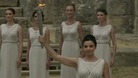The "high priestess" lights the Olympic flame.