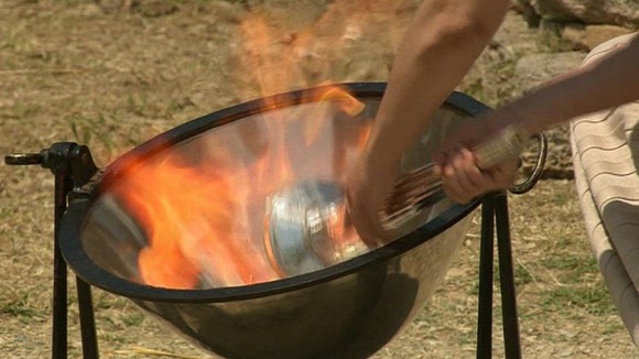 The flame is lit directly from the rays of the sun, through a parabolic mirror