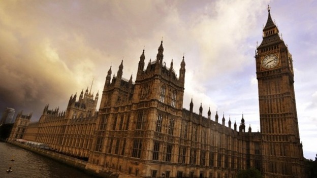 The Houses of Parliament with a cloud above.