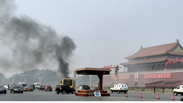 Chinese officials suspect yesterday's fatal car crash was the result of a suicide attack, according to Reuters sources.