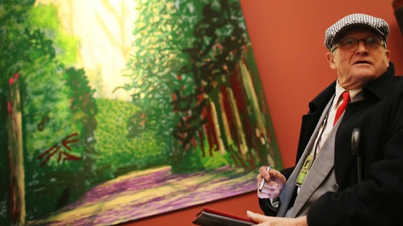 David Hockney's colourful image of the Queen's initials also features in the exhibition.