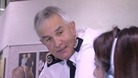 Peter Fahy talking to colleague