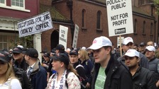 Police hold protest march around London