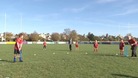 Children playing cricket in Cambridge.
