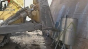 Syrian State TV showed these pictures of gas canisters being destroyed.