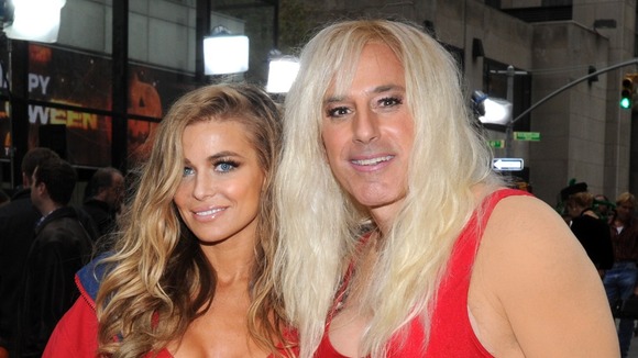 Carmen Electra and Matt Lauer as Pamela Anderson on 'Baywatch' appear on Halloween on the 'Today' show in New York.