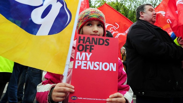 Annie Delaney, 8, joins Unite and PCS union members outside University Hospital Birmingham, Edgbaston.