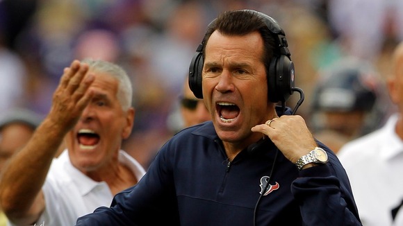 Houston Texans coach Gary Kubiak has been taken to hospital after collapsing in front of 70,000 fans.