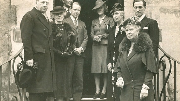 Sir Osbert Sitwell (extreme left), Queen Mary (extreme right) and others c 1943