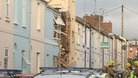 One woman who was in the house has been taken to hospital