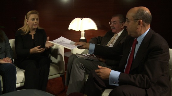 Yasser Arafat's widow Suha being presented with the forensic report.