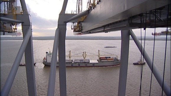 The giant cranes have been built on land reclaimed from the Thames