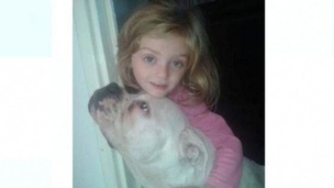 Lexi with the dog that is believed to have attacked her.