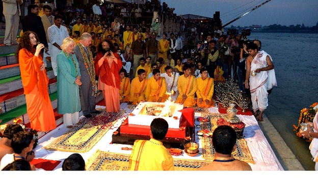 The Prince and Duchess on the banks of the Ganges.