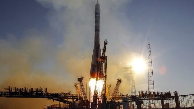 Soyuz spacecraft, with the Sochi 2014 Winter Olympic Games logo, blast off from the Baikonur cosmodrome, Russia.