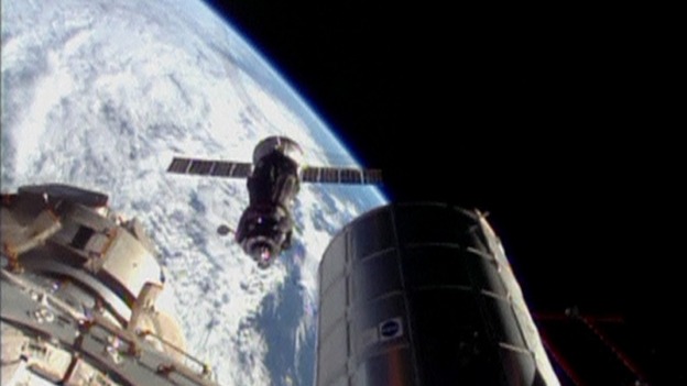 The Soyuz spacecraft prepares to dock with the International Space Station.