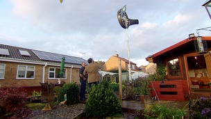 Energy saving hous including solar panels and wind turbine