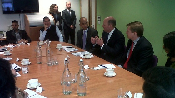 Hester in round table discussion with local businesses